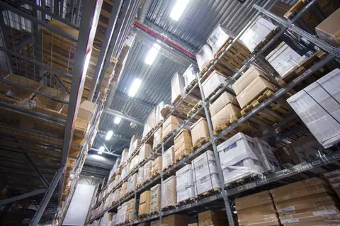 Warehouse racking stacked with pallets